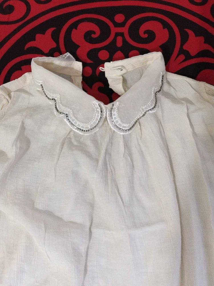 46.Elegant White Embroidered Blouse
