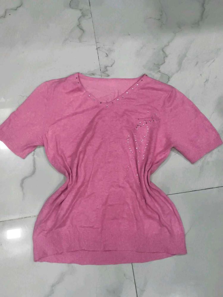 a beautiful V-neck Pink top with deads