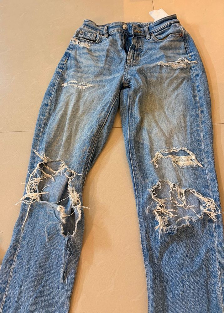 Distressed Blue Denim Jeans