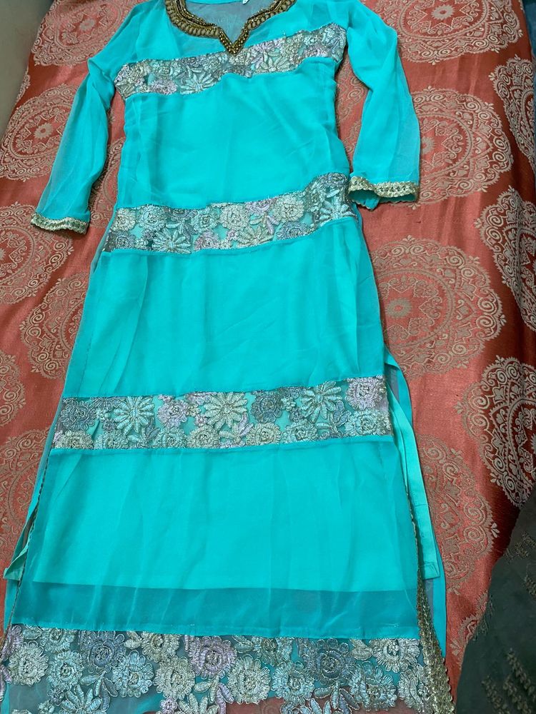 Elegant Teal Kurta Set with Intricate Embroidery