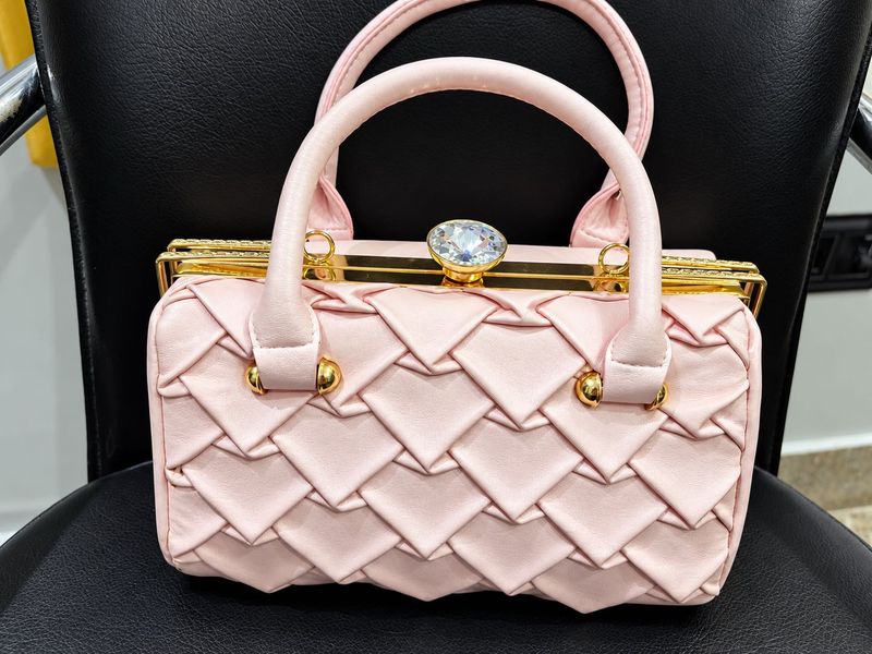 Elegant Pink Woven Clutch Bag