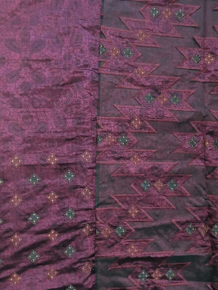 Elegant Purple Saree with Intricate Patterns