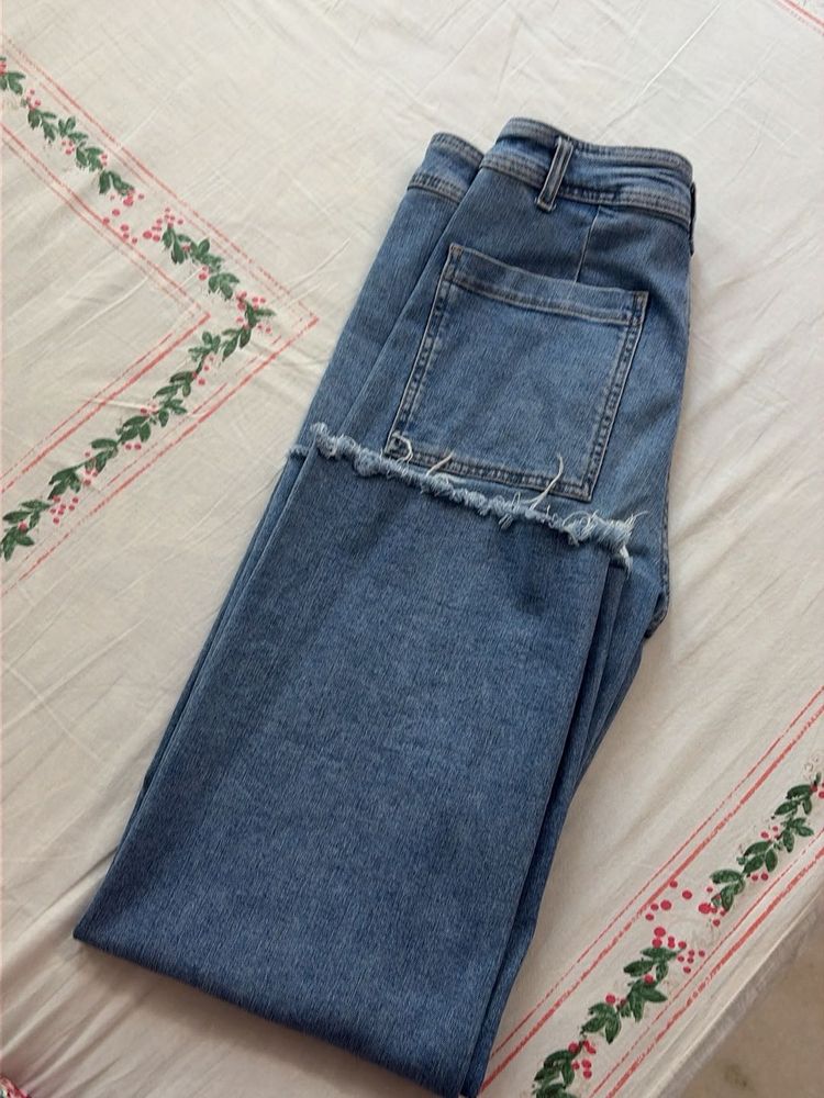 Blue Denim Jeans with Frayed Hem