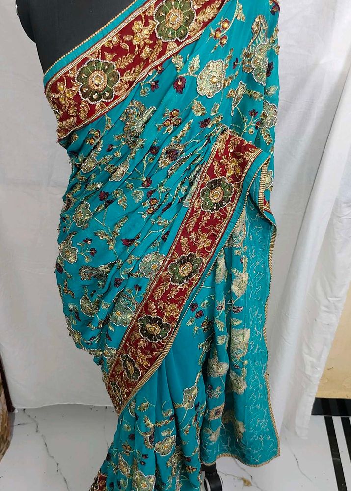 Exquisite Teal hand work heavy saree 🔥