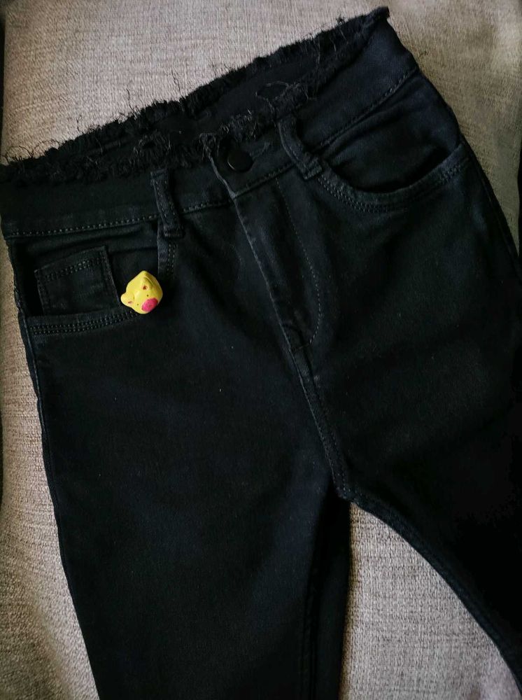 Stylish Black Jeans with Frayed Hem