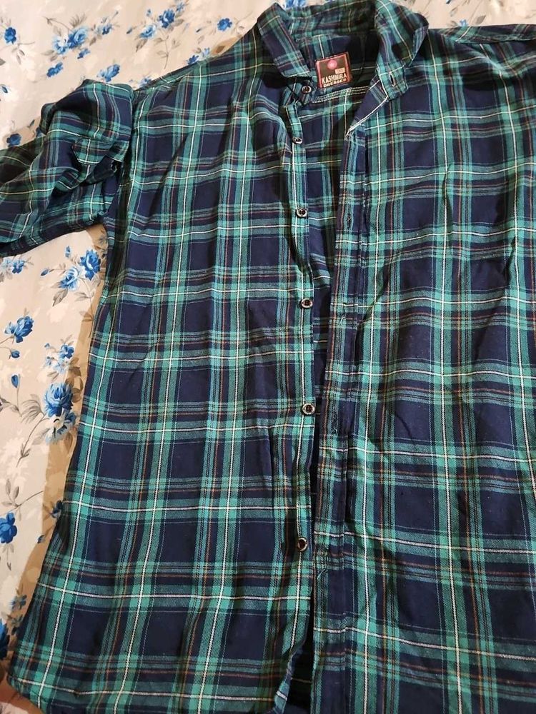 Classic blue and teal checkered full-sleeve shirt.