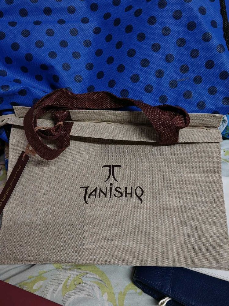Tanishq carry bag with card