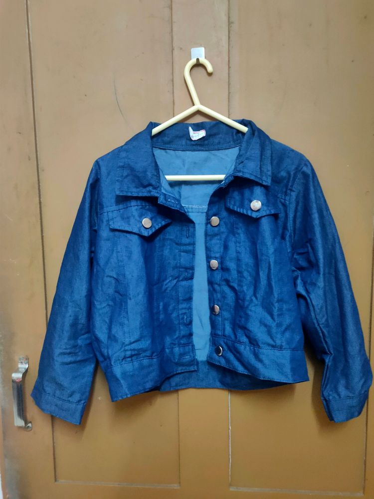 Blue jacket ( can also be used as top).Its in my cupboard for 1 year now. Haven't been used.