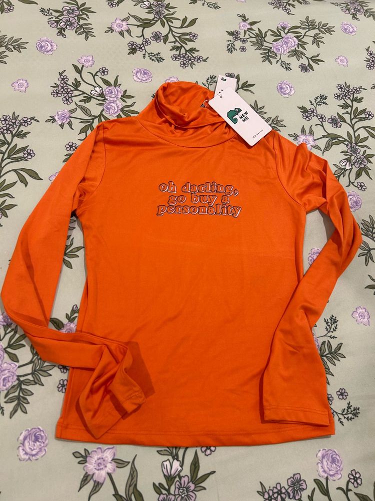 Orange Turtleneck Graphic Top