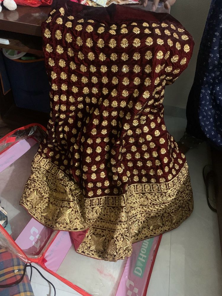 Exquisite Maroon Velvet Lehenga with Golden Embroi