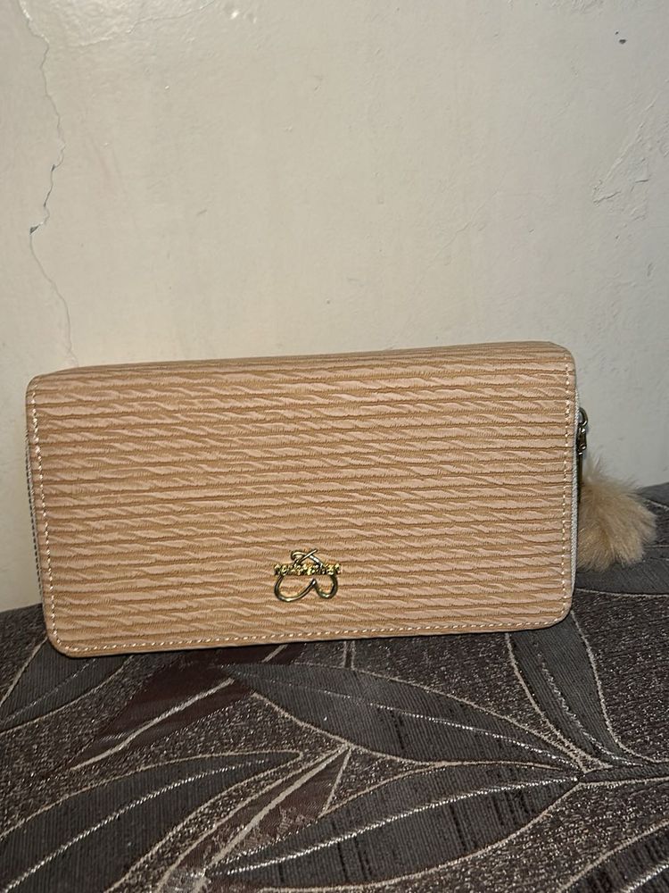 Chic Beige Textured Wallet with Pom Po