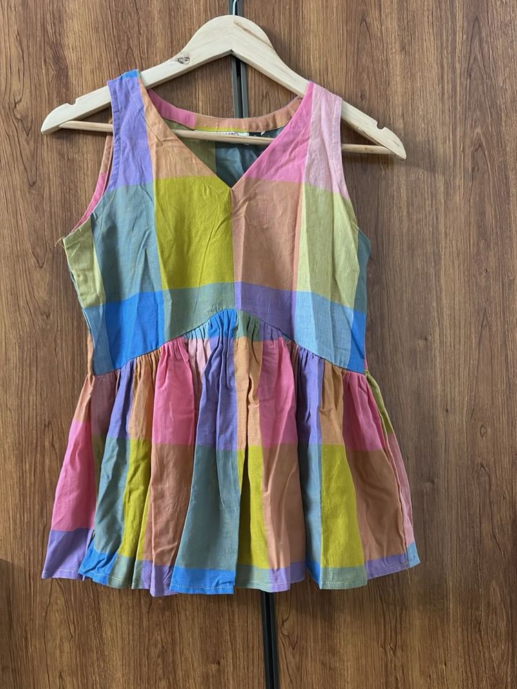 Vibrant Checkered Peplum Top