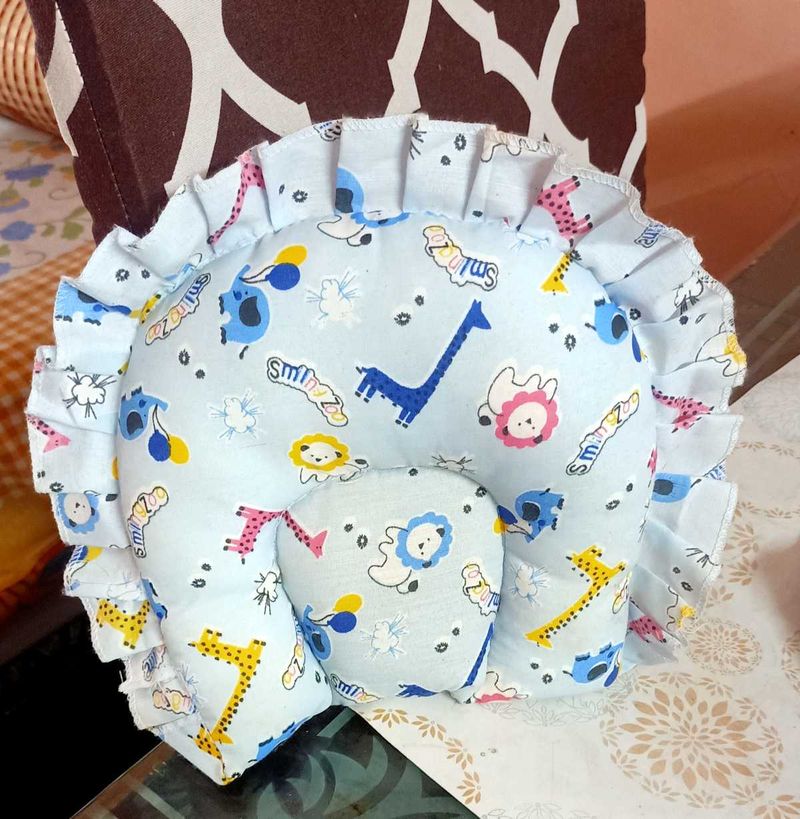 Rai Baby Pillow with Animal Prints.