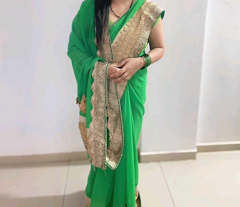 Elegant Green Saree with Golden Border