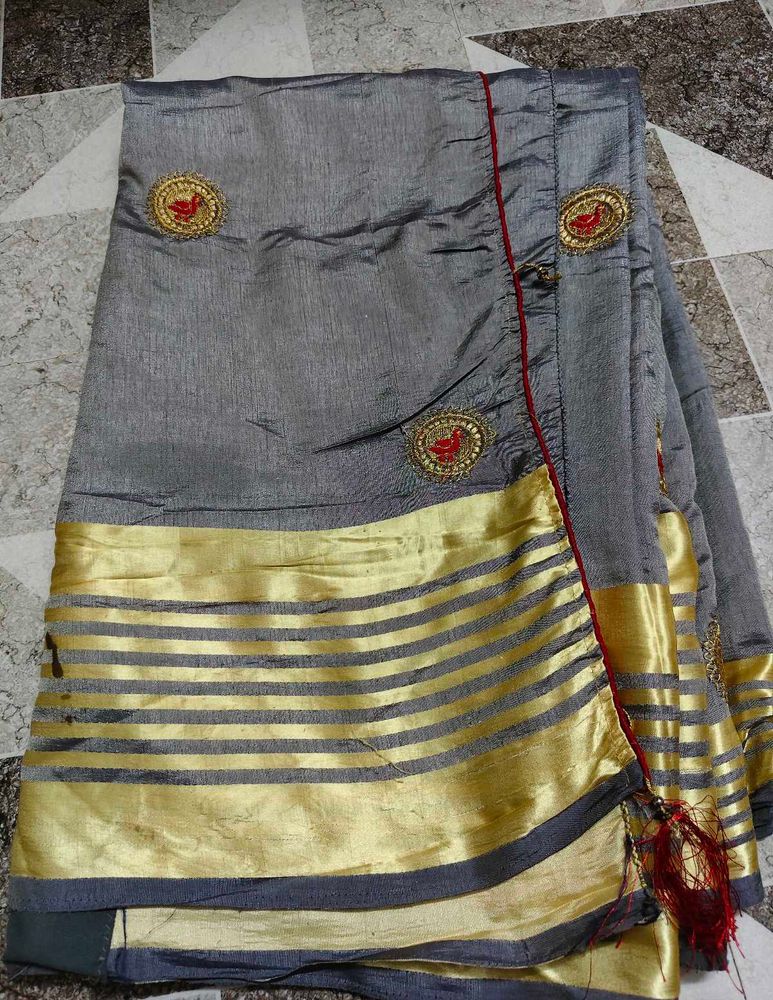 Elegant Grey Saree with Gold Border