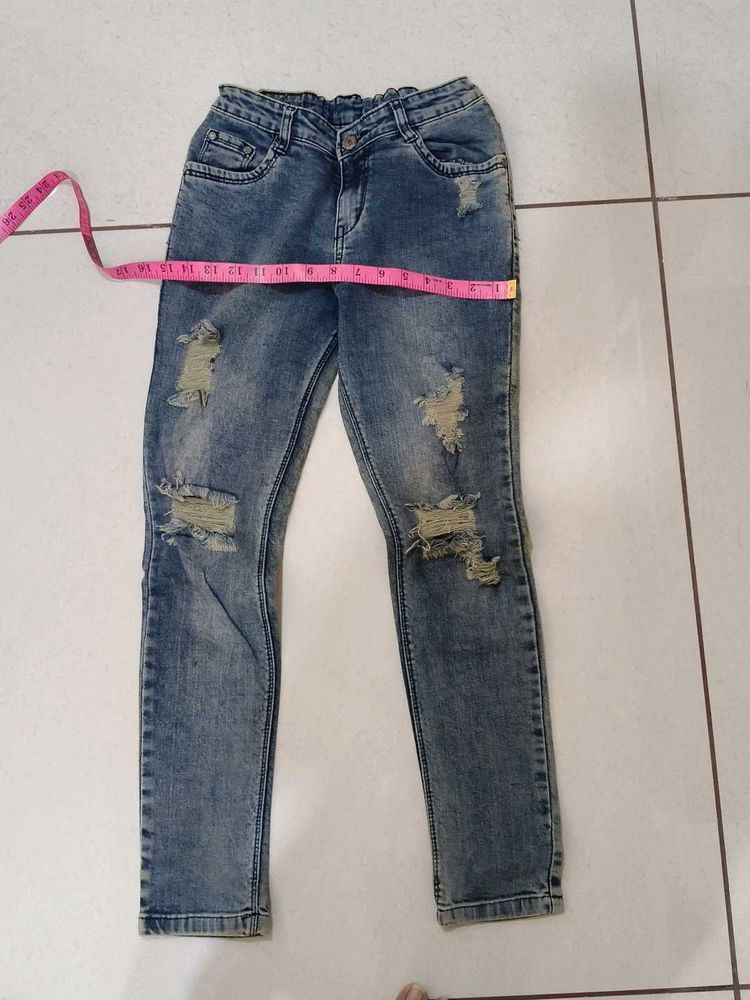 Distressed Blue Denim Jeans