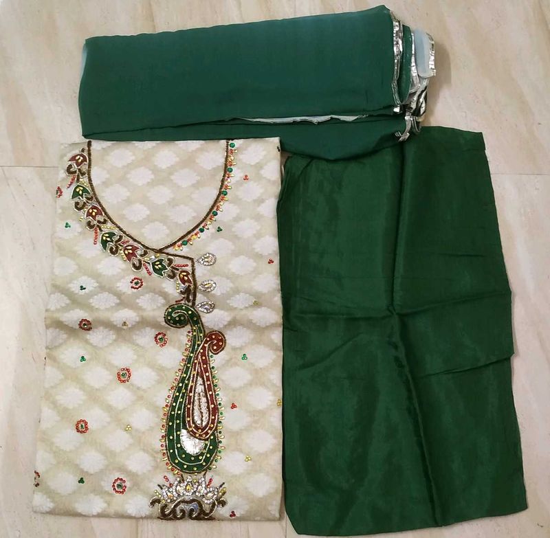 cream and green embroidery suit