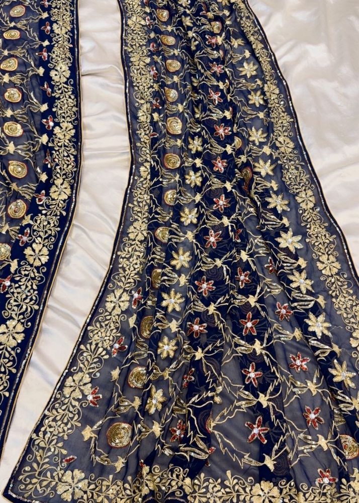 Embroidered Navy saree with Gold Accents