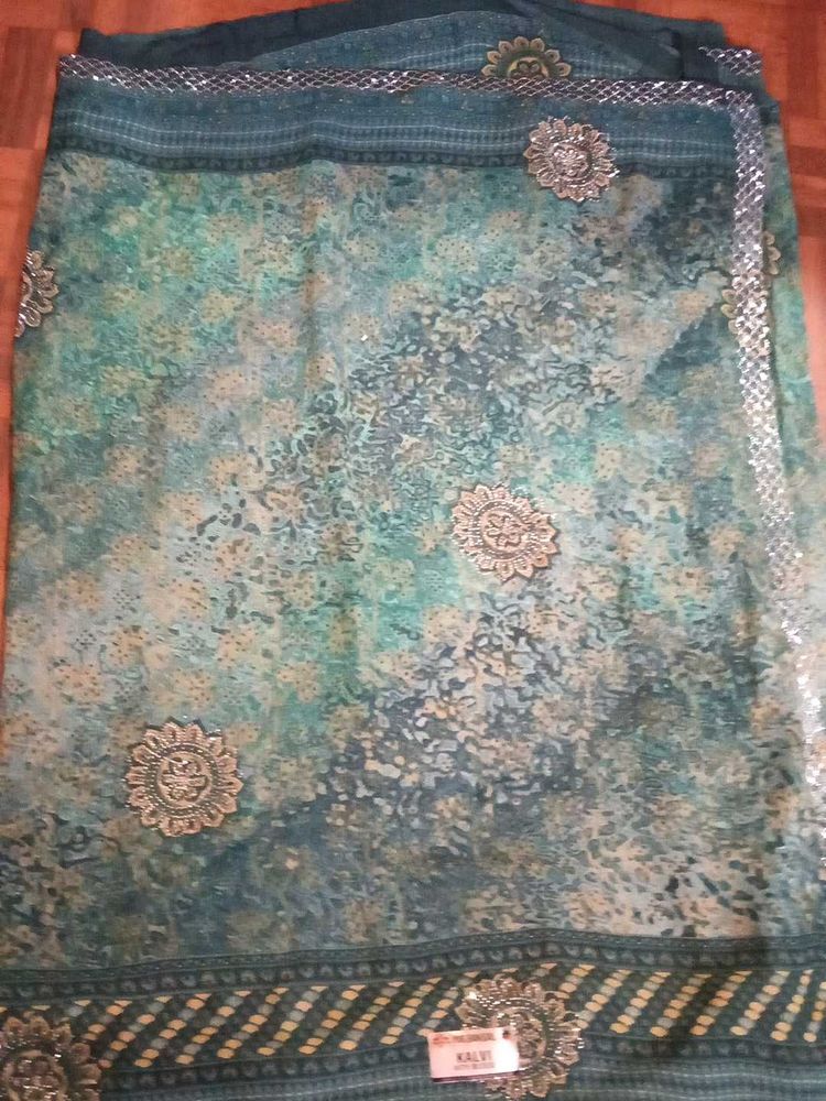 Elegant Green &amp; Silver Embroidered Saree