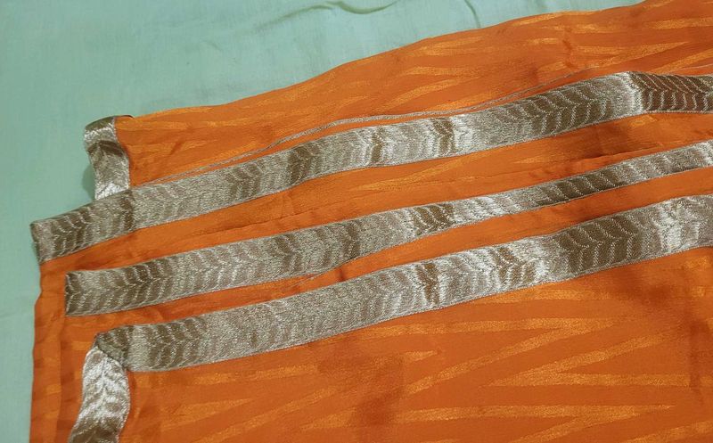 Orange dupatta with Silver Border