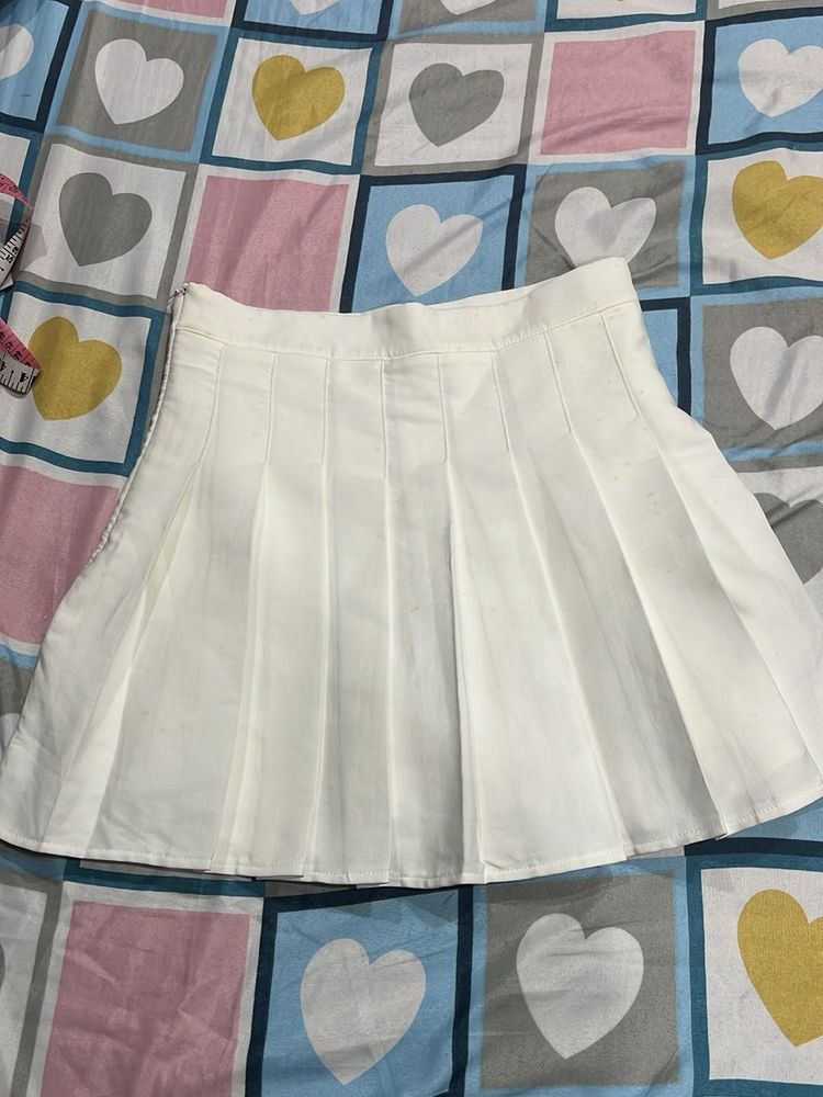 white mini pleated skirt