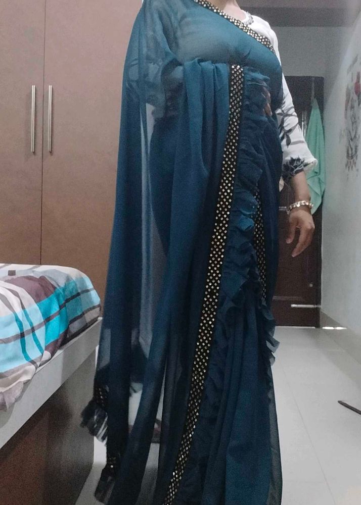 Elegant Teal Saree with Embellishments