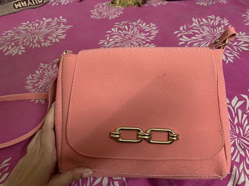 Chic Coral Crossbody Bag with Gold Chain Detail