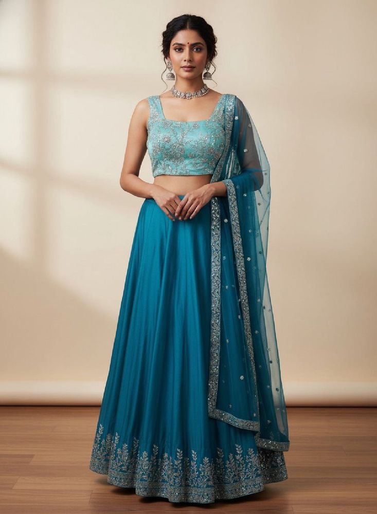 Blue embellished blouse