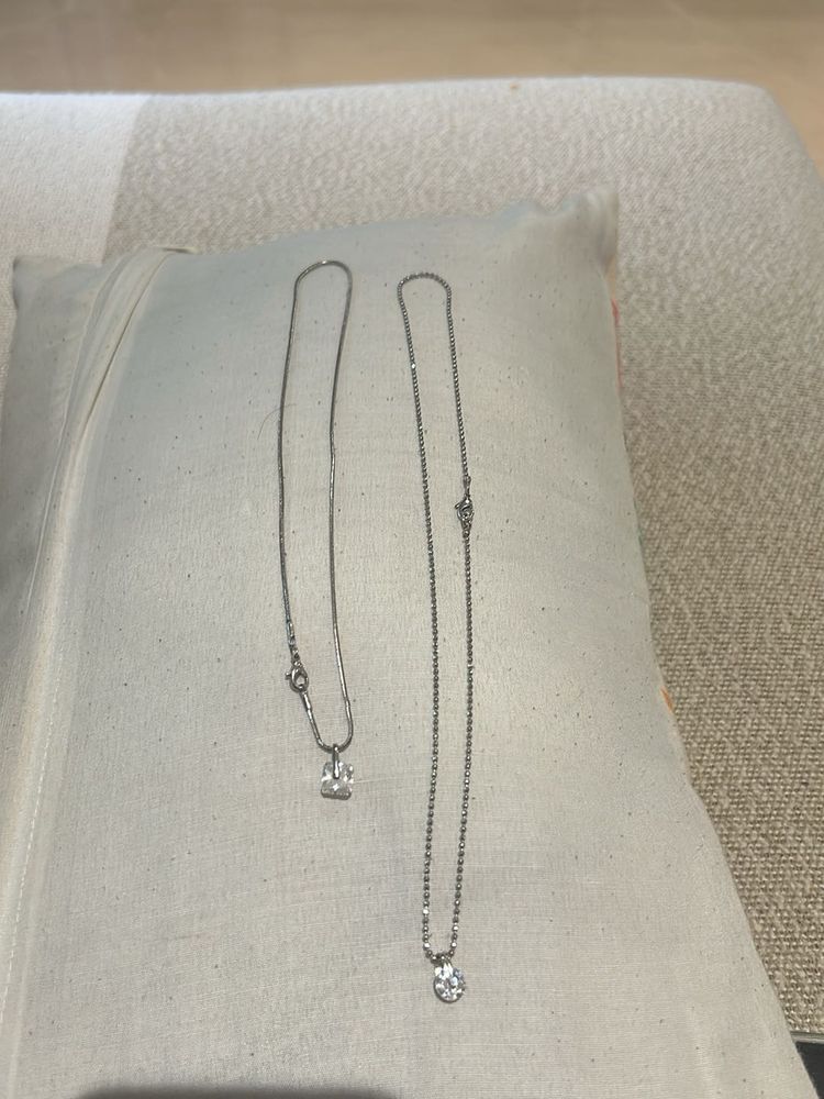 Two dainty diamond necklaces