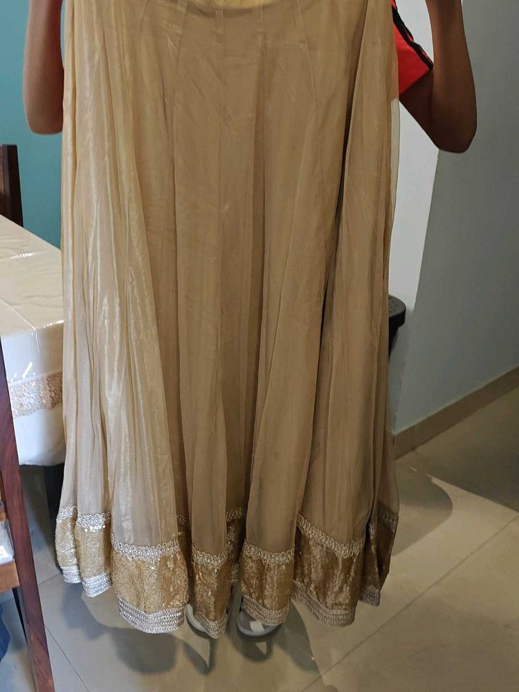 Elegant Beige Skirt with Embellished Hem