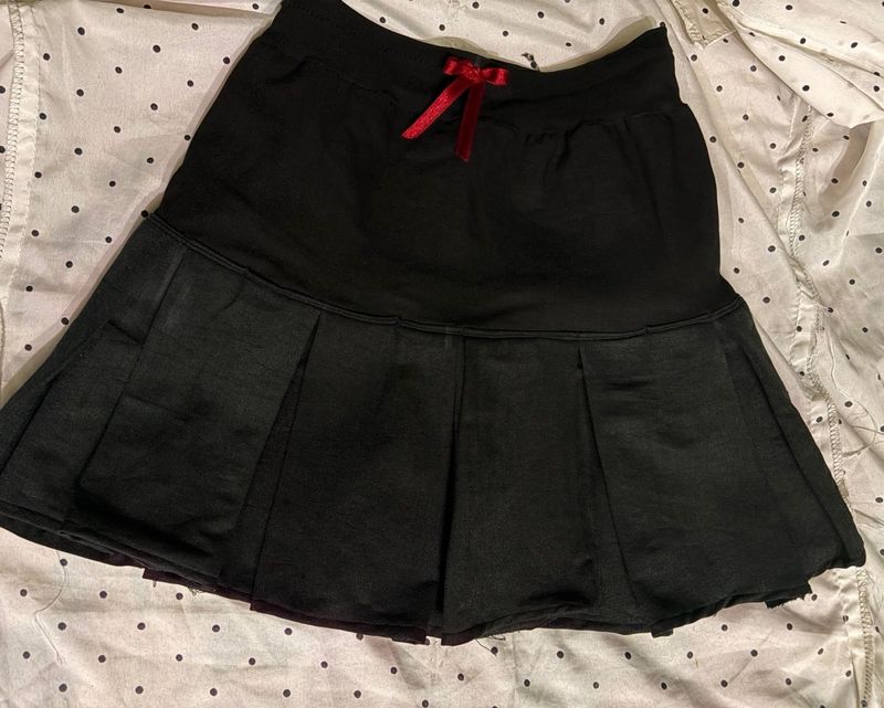 Cute Black pleated mini skirt with Red Bow