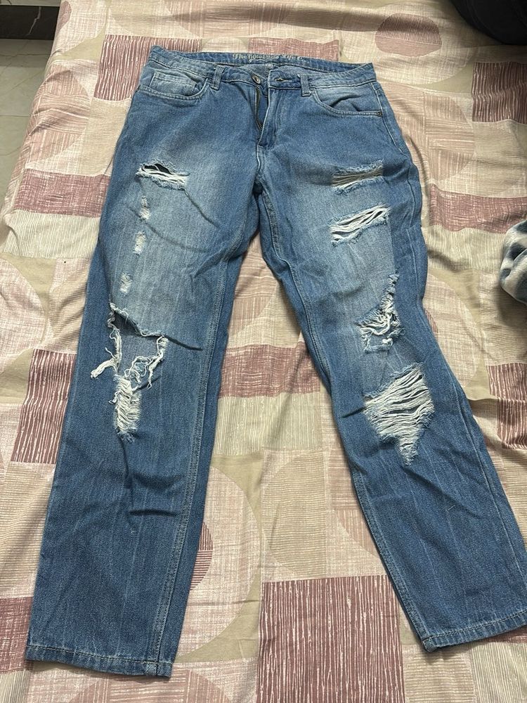 Distressed Blue Denim Jeans