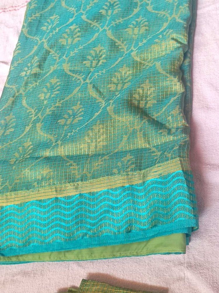 Beautiful Teal Saree with Gold Print