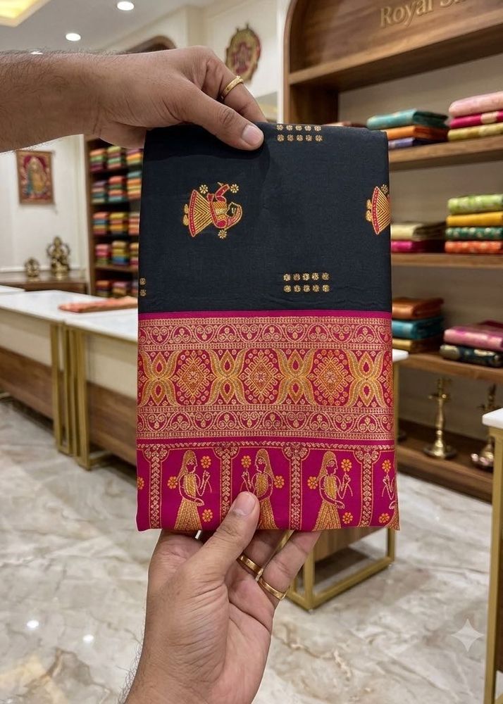 Elegant Black Saree with Pink Border