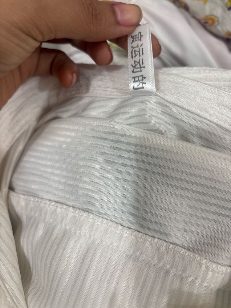 Elegant White Striped Top