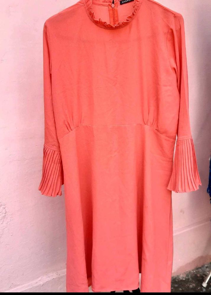 Elegant Coral Dress with Pleated Sleeves