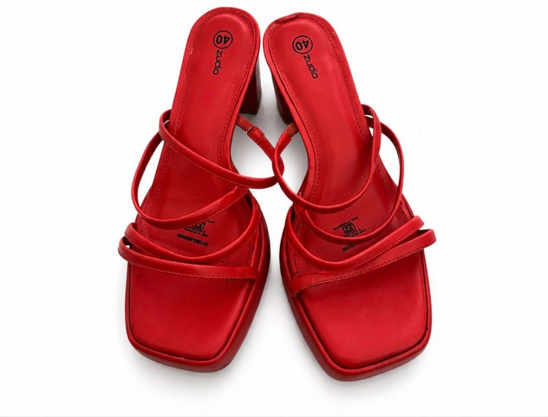 Unused red heels