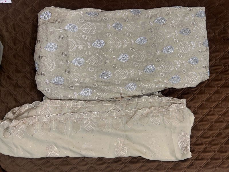 Embellished dress material