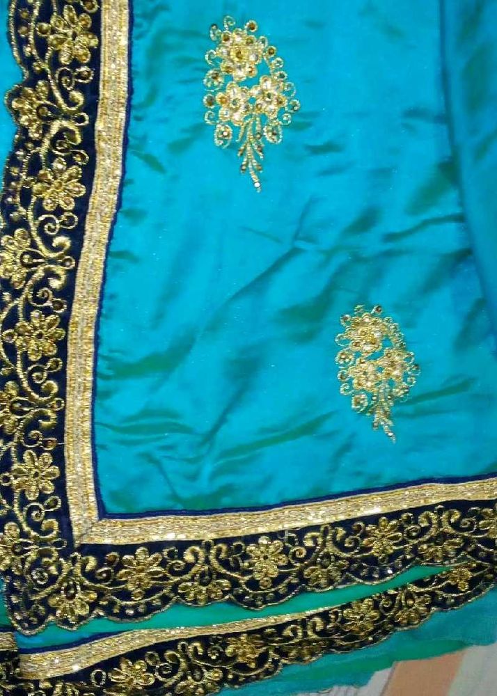 Stunning Teal Saree with Gold Embroidery