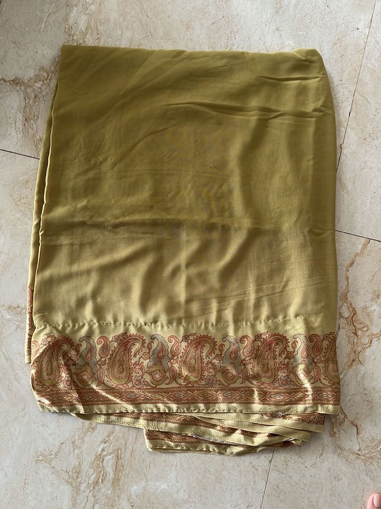 Elegant Golden Saree with Paisley Border