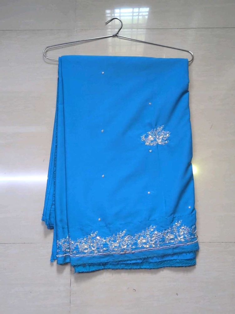 Beautiful Blue Saree with Silver Embellishments