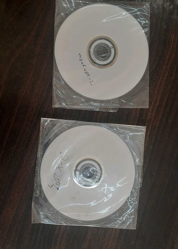 ps2 games  in disk any 1 game read discrption