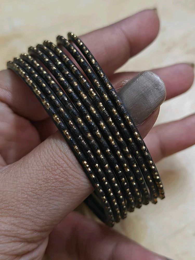 Set of 8 Black &amp; Gold metal Bangles