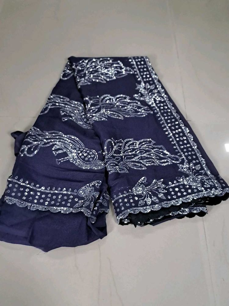 Elegant Dark Blue Saree with Silver Embellishments