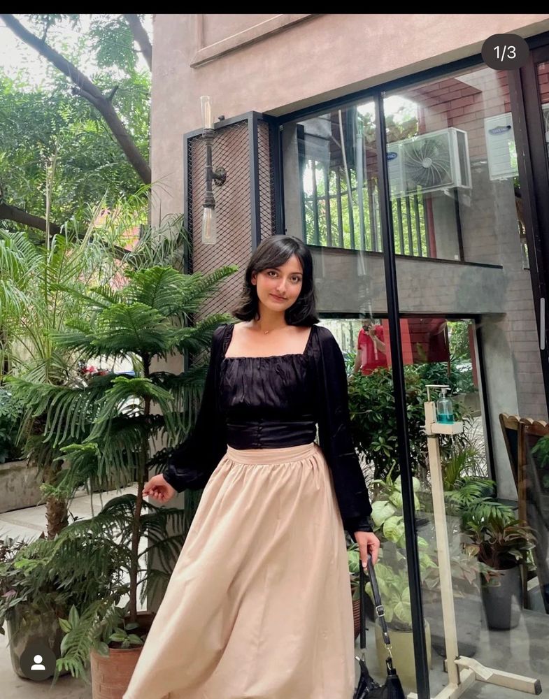 The black satin top your wardrobe is missing 🖤