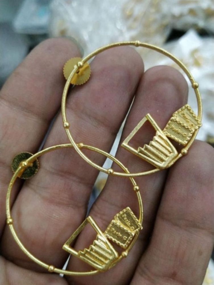 Golden Hoop Earrings with Unique Design