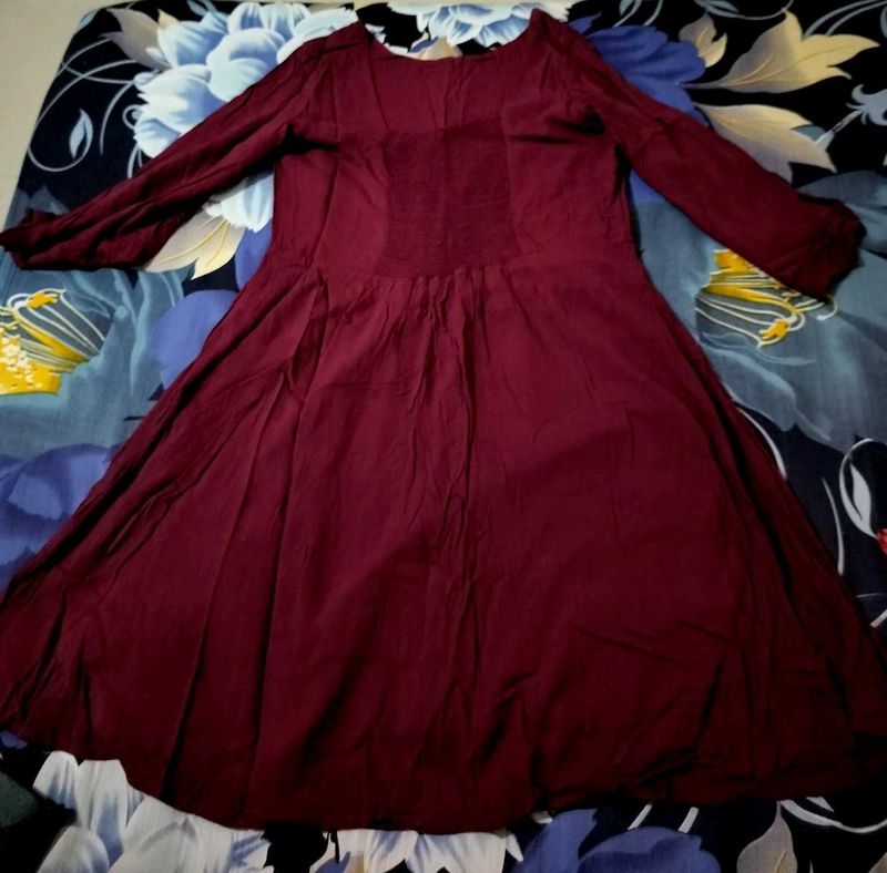 wine red/maroon frock with a slit bell sleeves
