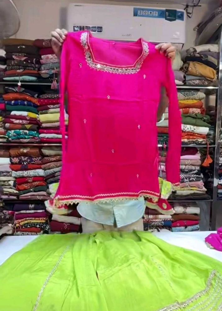 Vibrant Pink Kurta Set with Green Skirt