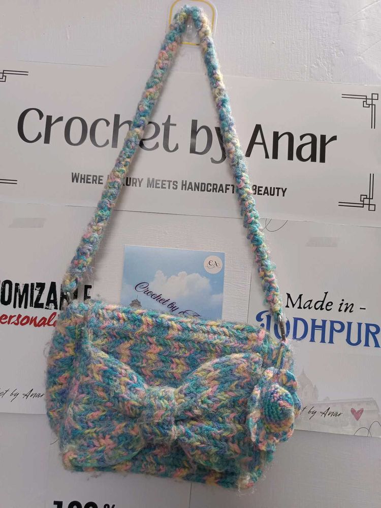 Crochet shoulder bow bag with mini hat tassel