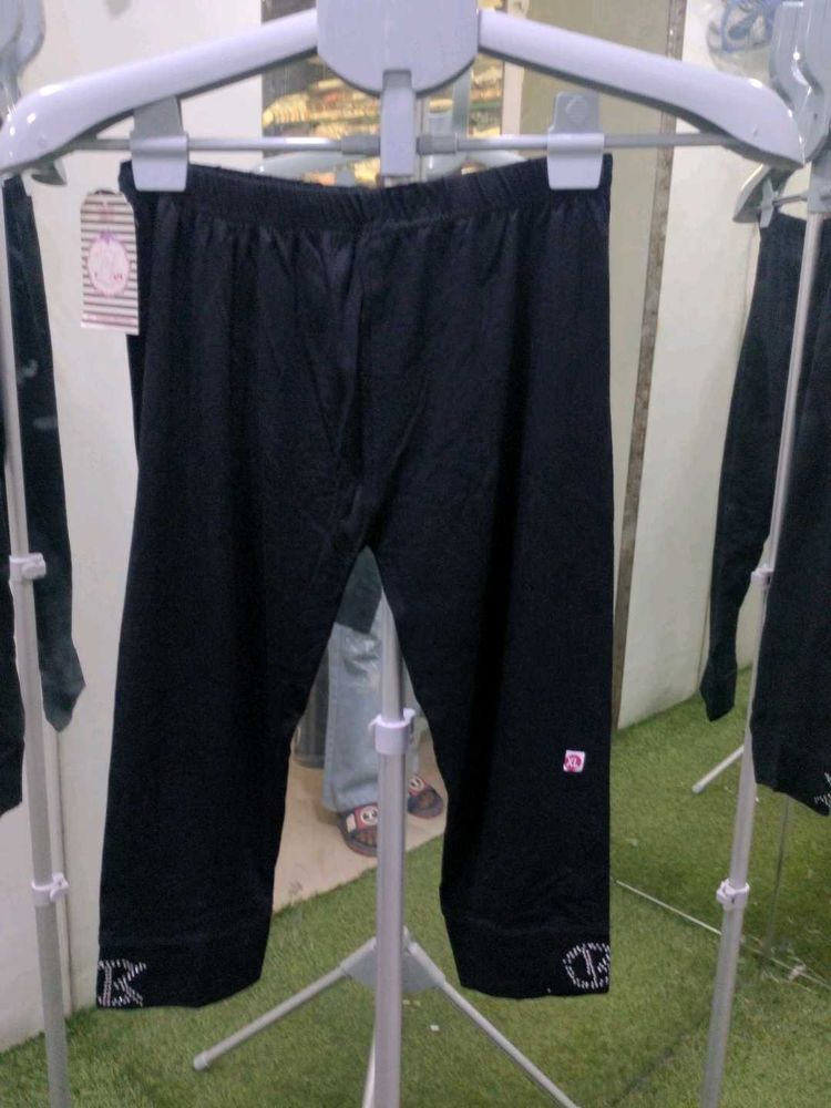 Black Capris with Embellished Hem